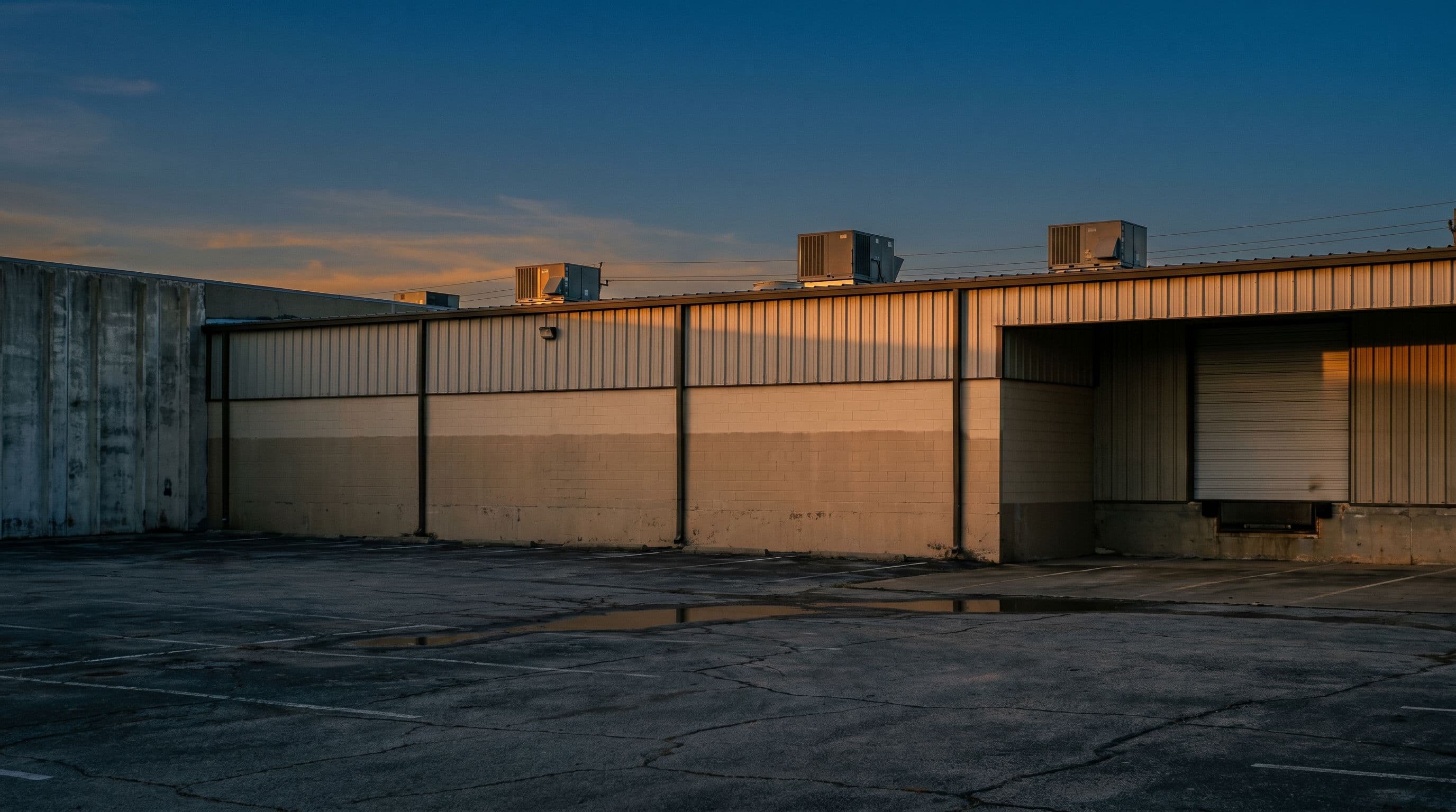 Lewisville, TX commercial property at dusk.